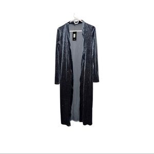 Duster from fashion nova missing string but is in good condition